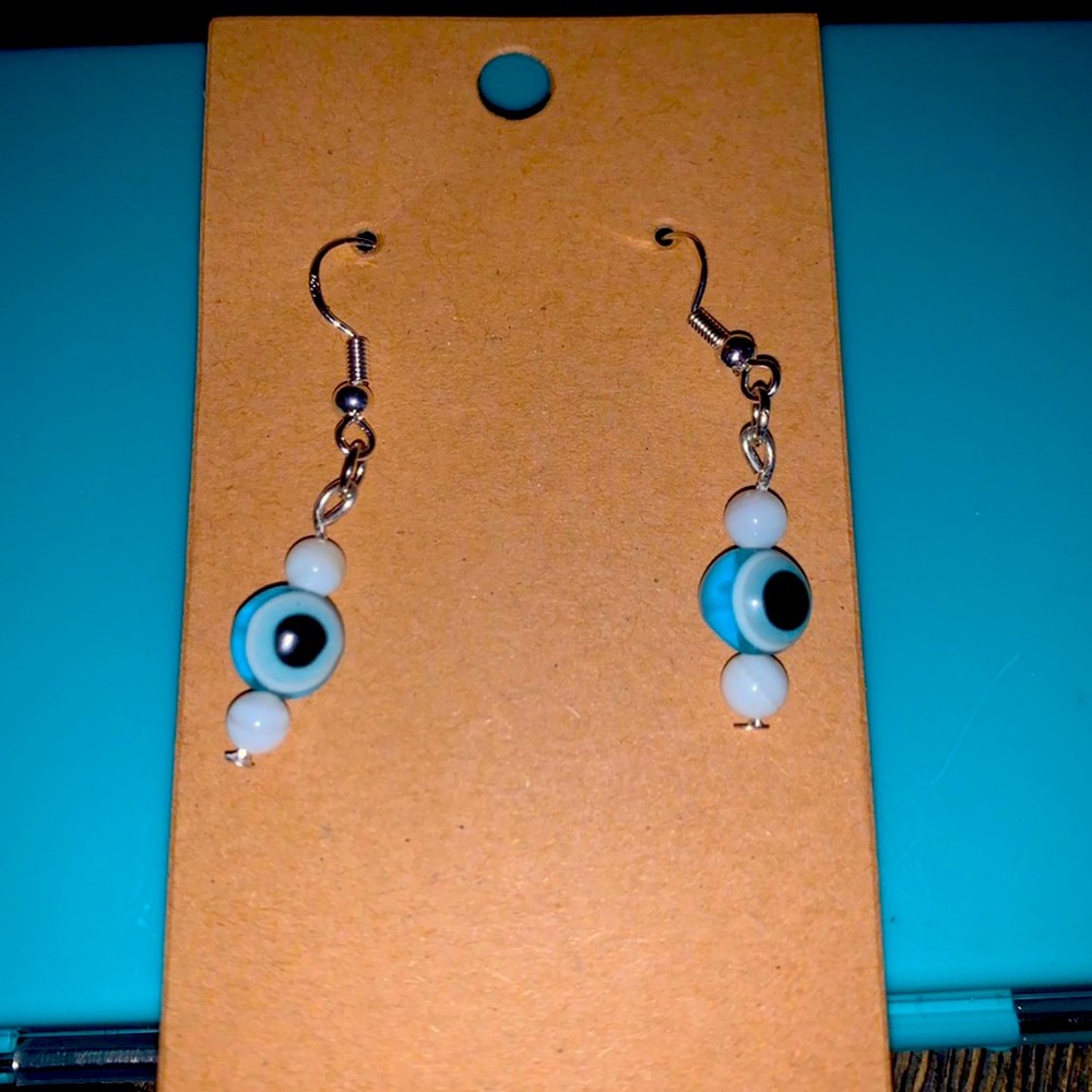 Teal evil eye dangle earrings